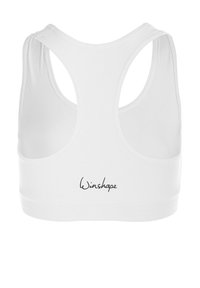 Valkoinen urheil bra, jossa on kaareva selkäosa, valmistettu joustavasta kankaasta. Alhaalla edessä on musta "Winshape" -logo. Silkkinen pinta.