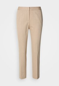 Calças beiges ajustadas em tecido texturizado, com corte slim, cintura média e design de perna reta. Fecho com botão e zipper na frente.