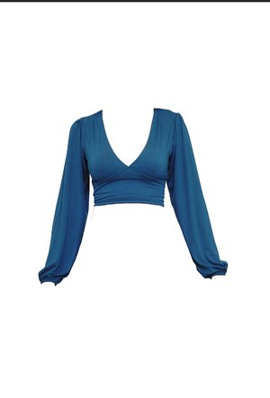 Teal long-sleeve cropped top with a deep V-neck, gathered sleeves, and a fitted bodice, made of soft, stretchable fabric.
