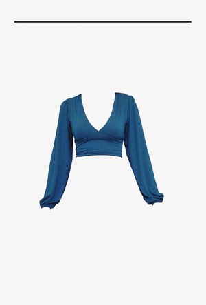 Top corto a maniche lunghe color teal con scollo a V profondo, maniche arricciate e corpino aderente, realizzato in tessuto morbido ed elastico.