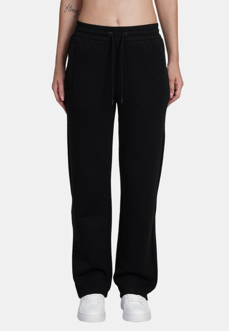 Zwarte sweatpants van zachte stof, met een elastische tailleband met trekkoord, twee zijzakken en een comfortabele pasvorm.