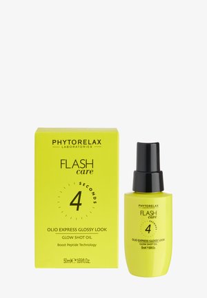Gul flaske og æske med Phytorelax Flash Care Glow Shot Oil med sort pumpe og tekst, der fremhæver 4 sekunders glansboost.