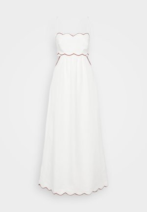 White, sleeveless dress with a scalloped neckline and hem, cinched waist, made of lightweight fabric, featuring thin straps and contrasting red trim.