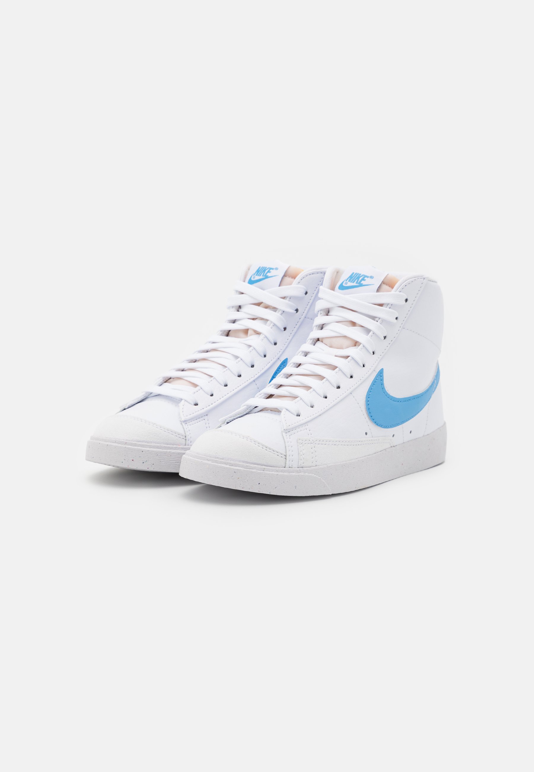 nike blazer mid 77 trainers in white and blue