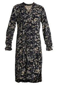 Musta mekko, jossa on pitkät hihat ja V-päärme. Siinä on valkoisia ja kultaisia kukka kuvioita. Pehmeä kangas, jossa on kootut hihansuut ja sivutaskut.