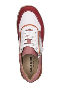 Red and white sneaker with leather and suede materials, featuring white laces, a side zipper, and a brown rubber sole.