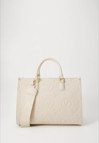 Cream textured handbag with embossed V logos and floral patterns, dual handles, and a wide detachable shoulder strap with a floral design.