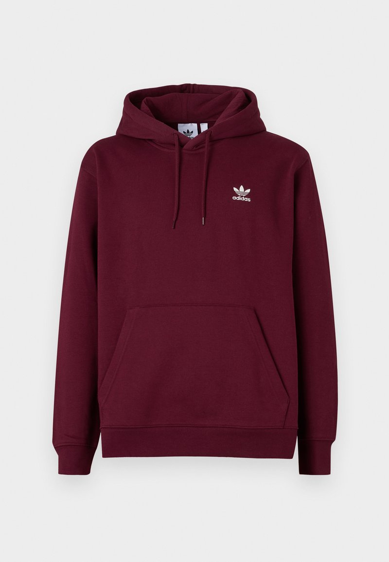 Bordowy hoodie Adidas z przednią kieszenią kangurką, regulowanym kapturem ze sznurkiem i małym białym logo Adidas na lewej piersi.