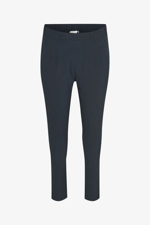 Pantalon sur mesure bleu marine, avec une texture lisse, présentant des plis à l'avant et une taille élastique pour le confort.