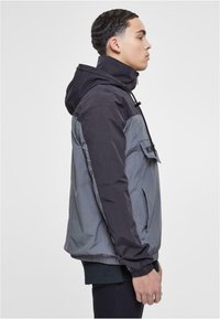 Karl Kani RETRO SPLIT  - Windbreaker - black