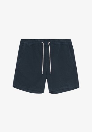 Σκούρα μπλε μαγιό με ελαστική μέση, λευκή κορδόνι και πλαϊνές τσέπες. Υλικό από βαμβάκι με λεία, ελαφριά υφή.