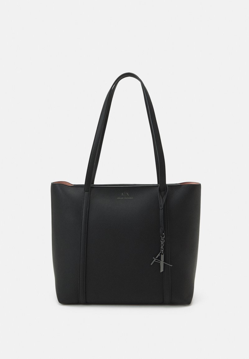 Black tote bag made of textured synthetic material. Features two long handles, a metallic zipper pull, and a subtle logo on the front.