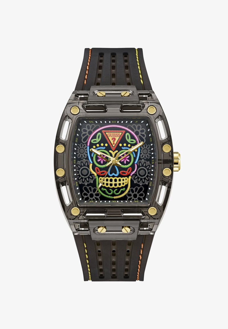Smartwatch με μαύρο λουρί και διαφανές πλαίσιο, με πολύχρωμο κεντητό σχέδιο κρανίου και δείκτες και βίδες σε χρυσό χρώμα.
