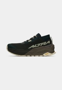 Black and dark green running shoe with a mesh upper, textured design, and a rubber sole. Features a prominent logo, laces, and pull tab.