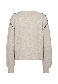 Lichtbeige cropped trui, gebreide textuur, met zwarte stiksels langs de schoudernaden. Lange mouwen met ribboordkappen.