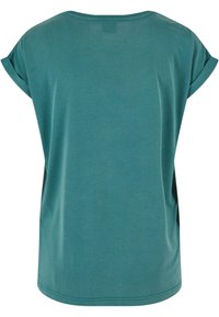 T-shirt pour femme à manches courtes de couleur bleu sarcelle, avec revers roulés, encolure ronde et coupe décontractée, vue de dos.