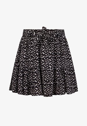 Jupe à volants noire et blanche avec un motif léopard, dotée d'une ceinture à nouer à la taille et d'une texture de tissu douce et légère.