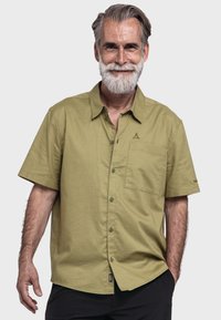 Olivenfarbene Kurzarmshirt aus strukturiertem Stoff, mit Brusttasche, Knopfverschluss und kleinem Logo auf der linken Seite.