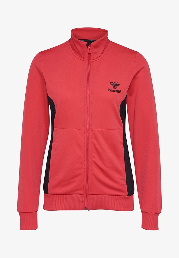 Veste de sport rouge avec fermeture éclair à l'avant, col montant, panneaux latéraux noirs et logo Hummel sur la poitrine. Confectionnée en matériau lisse et léger.