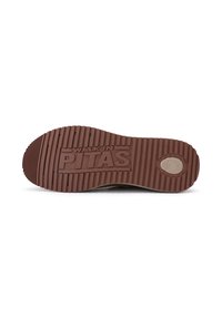Brązowa gumowa podeszwa z teksturą żłobioną, z wypukłym napisem "WALK IN PITAS" oraz okrąłym logo po boku.