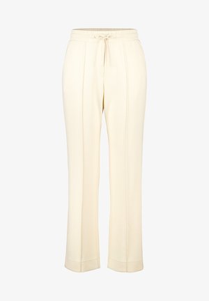 Crème-kleurige elastische broek met tailleband en trekkoord, met rechte benen en eenvoudige stikseldetails. Gemaakt van zachte, lichte stof.