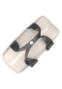 Világos bézs táska sima felülettel, fekete szövetfülekkel, cipzáras záródással és két szürke díszítőelemmel az oldalán. Kompakt és letisztult dizájn.