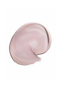Pale pink cream spread on a flat surface, with a smooth, glossy texture. The product has a subtle sheen and rounded edges.