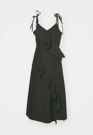 Μαύρο φόρεμα με ριχτό σχέδιο, λεπτές τιράντες που δένουν στους ώμους, εφαρμοστό κορσέ και φουσκωτή φούστα. Φτιαγμένο από ελαφρύ ύφασμα.