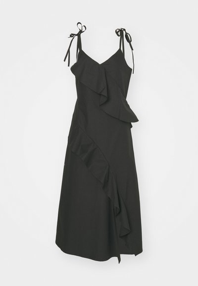 Μαύρο φόρεμα με ριχτό σχέδιο, λεπτές τιράντες που δένουν στους ώμους, εφαρμοστό κορσέ και φουσκωτή φούστα. Φτιαγμένο από ελαφρύ ύφασμα.