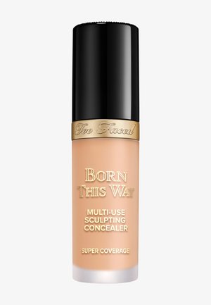 Too Faced Born This Way multi-use sculpting concealer in beige with black cap and gold branding, labeled super coverage.