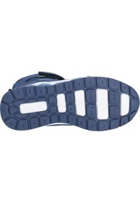 Suola di scarpa atletica navale con battistrada in gomma testurizzata. Accenti bianchi con design a zigzag. Cintura in velcro sulla parte superiore per una facile chiusura.