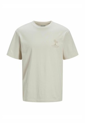 Helles beige Baumwoll-T-Shirt mit Rundhalsausschnitt. Auf der linken Brustseite befindet sich ein kleines Palmenbaum-Logo in hellbraun. Kurze Ärmel.