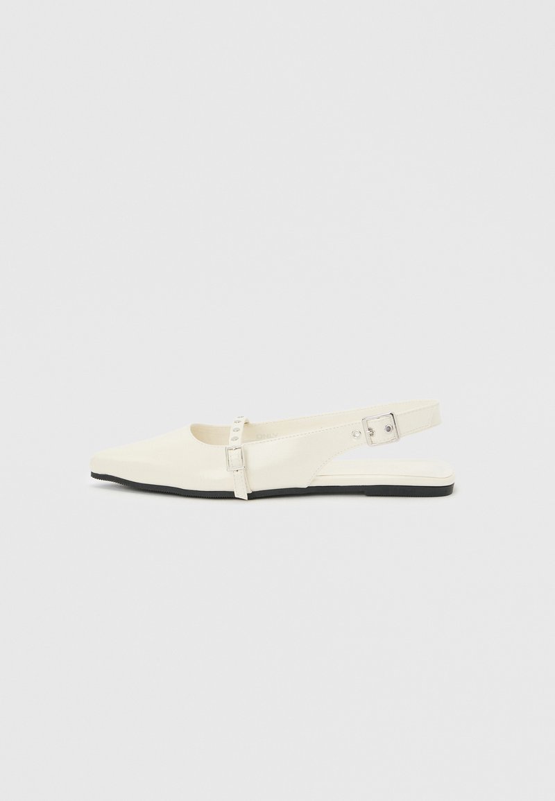 Πλατφόρμα slingback σε κρεμ απόχρωση με μυτερή μύτη, διακοσμητική αγκράφα στο πλάι και λεπτό λουράκι πάνω από το πόδι.