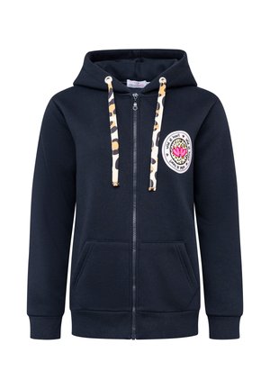 Marineblaue Zip-Hoodie aus weichem Stoff, mit Leopardenmuster-Kordeln, Fronttaschen und einem runden Aufnäher mit buntem Design.