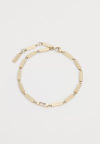 Gold chain bracelet featuring rectangular links with a small rectangular accent and clasp closure. Smooth, polished metal finish.