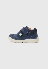 Navy blue suede shoe with a textile upper, two Velcro straps, green stitching accents, and a light rubber sole.
