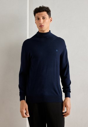 - Sweter