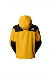 Žlutá nepromokavá bunda s černým yoke a rukávy. Obsahuje kapuci a logo na zadní straně. Viditelná texturovaná tkanina.