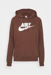 Brown Nike hoodie with a front pocket, drawstring hood, and large white logo across the chest. Soft fabric with ribbed cuffs and hem.