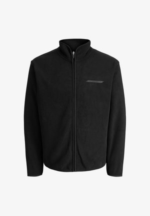 Schwarze Fleecejacke mit hohem Kragen, vorderem Reißverschluss und einer kleinen, mit Reißverschluss versehenen Brusttasche. Sie hat eine weiche Textur und eine lockere Passform.