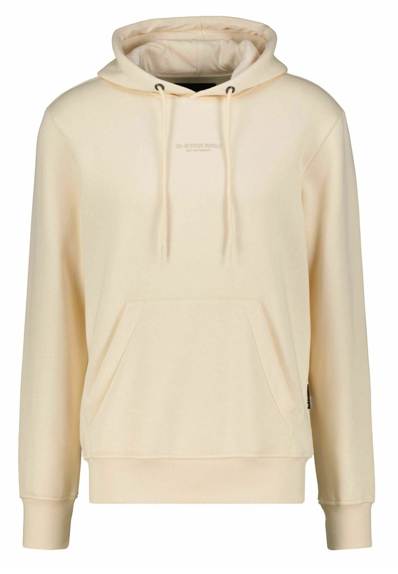 Sweatshirt couleur crème avec une capuche à cordon de serrage, une poche kangourou, des poignets et un ourlet côtelés. Le tissu doux présente un logo discret sur le devant.