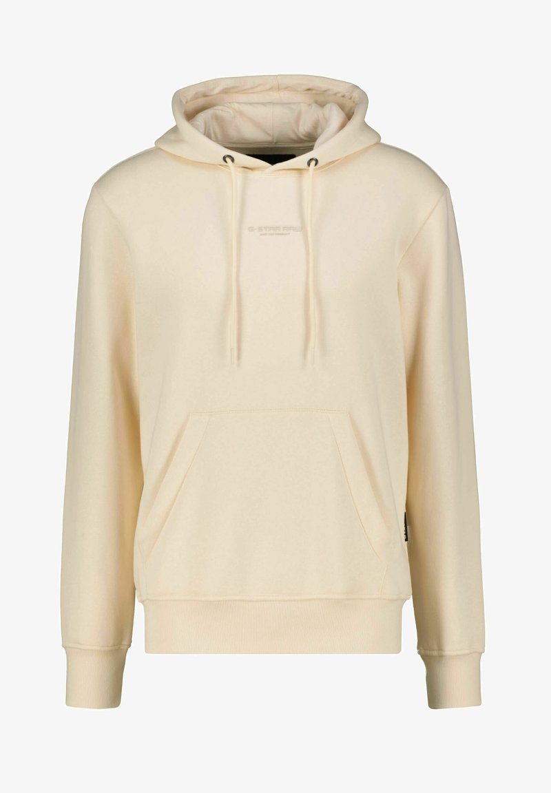 Sweatshirt couleur crème avec une capuche à cordon de serrage, une poche kangourou, des poignets et un ourlet côtelés. Le tissu doux présente un logo discret sur le devant.