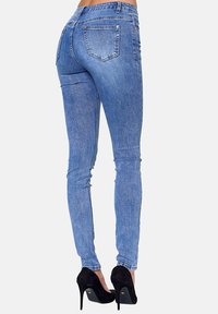 Elara STRETCH - Vaqueros pitillo - blau