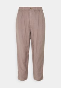 Světle béžové lněné kalhoty s elastickým pasem a zapínáním na knoflík. Mají uvolněný střih a mírně zúžené nohavice.