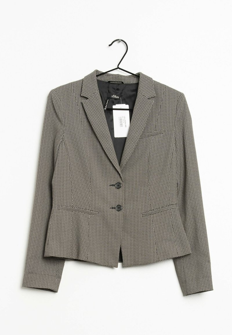 Blazer noir et blanc à motifs avec deux boutons, col à revers crantés, manches longues et une étiquette de marque visible, suspendu sur un cintre noir.