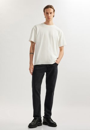 Vaqueros tapered - black