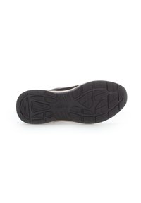 Semelle d'une chaussure noire avec motif de bande de roulement et nom de marque "Gabor" embossé au centre, photographiée sur fond blanc.