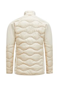 Pufferjakke i lys beige med en quiltet bølget mønster på ryggen, høj krave og glatte ærmer.