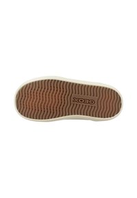 Suela de un zapato Geox con borde exterior beige y agarre texturizado marrón que presenta el logo de Geox y el texto "patente italiana".