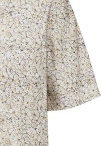 Tessuto con motivo floreale color crema, con contorni dorati e neri dei fiori. Design con maniche corte e larghe. Texture leggera.